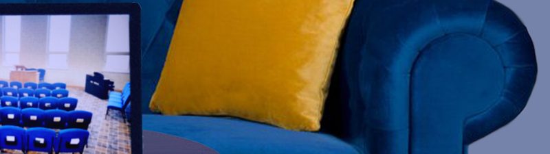 livestream with blue sofa and yellow pillow in the background