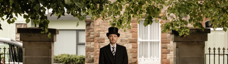Man in top hat and suit